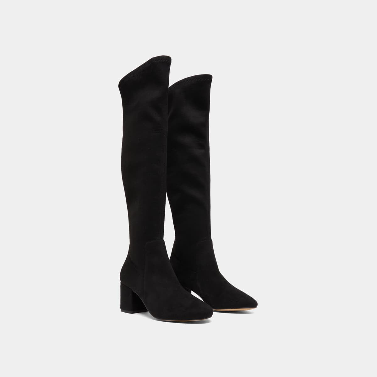 Thigh-high boots with low heels
