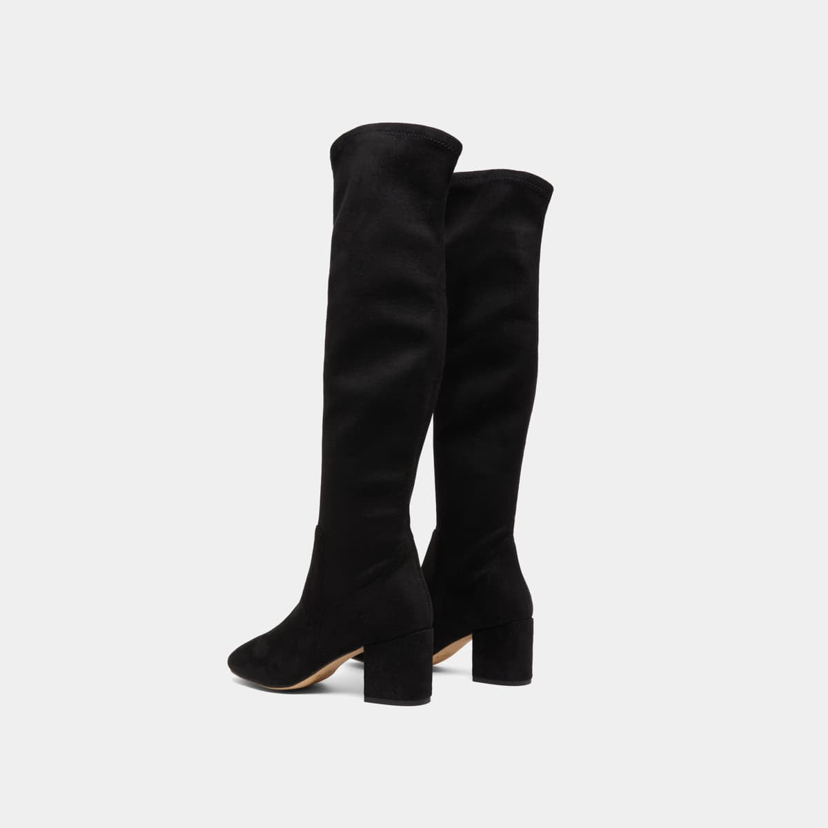Thigh-high boots with low heels